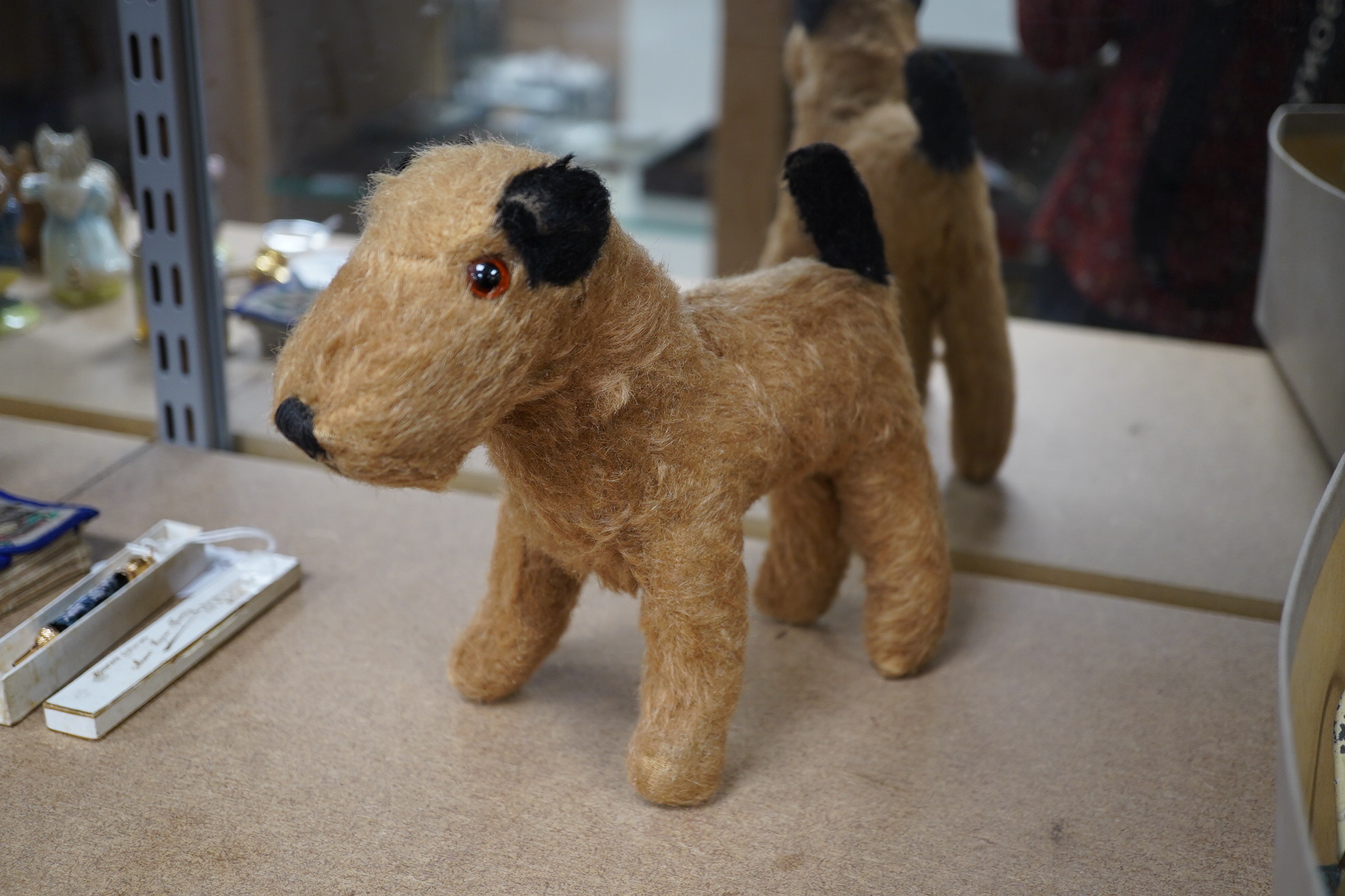 A group of various tinplate and other toys including Britains and Dinky and a 20th century straw filled dog. Condition - poor to fair